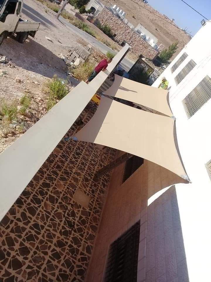 مظلات شد إنشائي حديثة