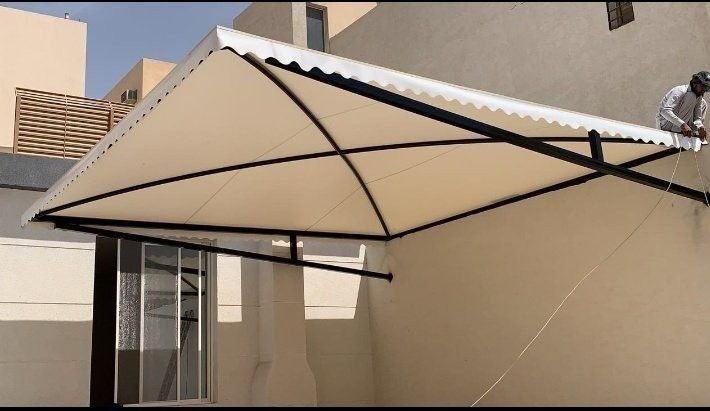 تنفيذ مظلات سيارات قماش جيزان